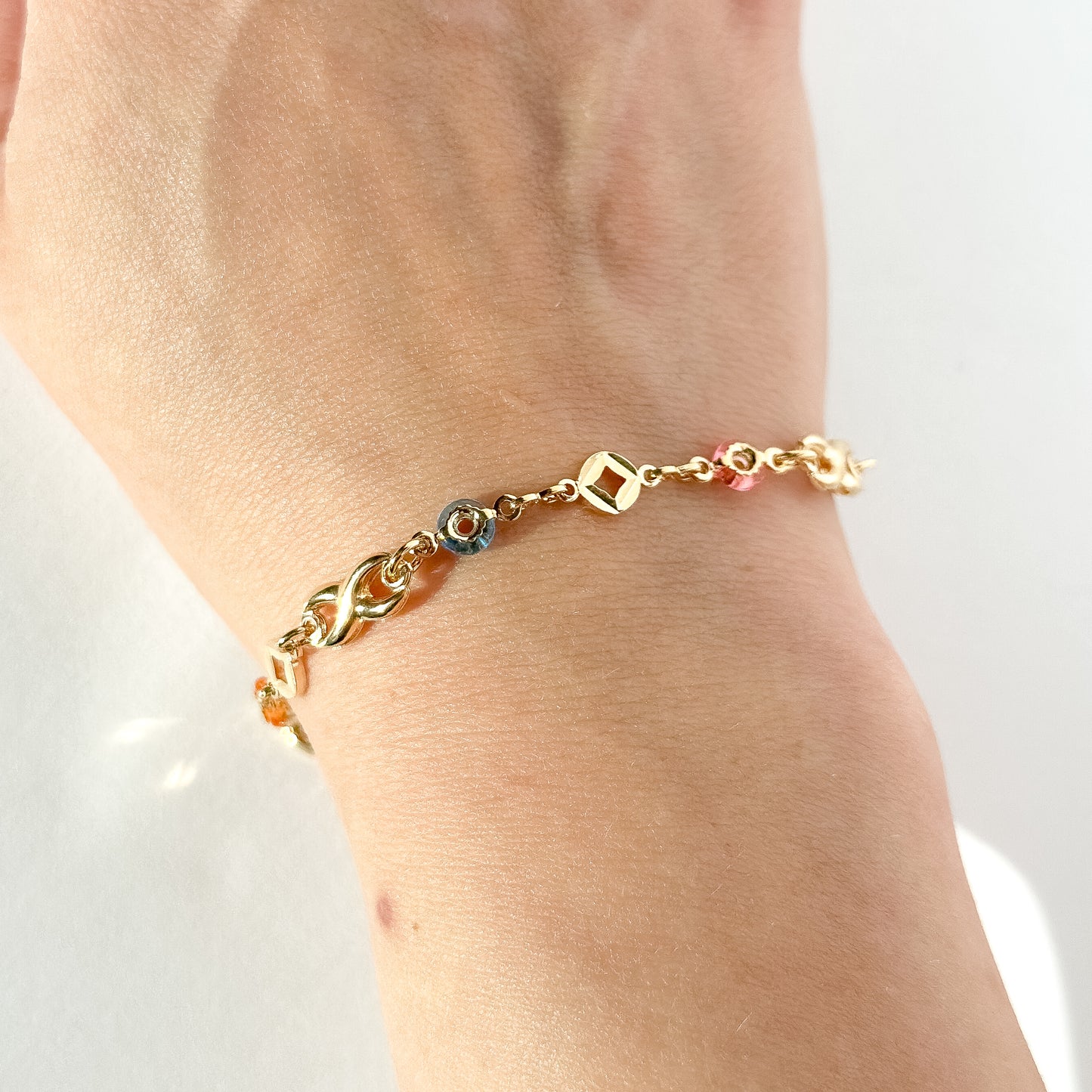 Infinite Signs + Circular Pastel-Toned Gold Filled Glass Bracelet