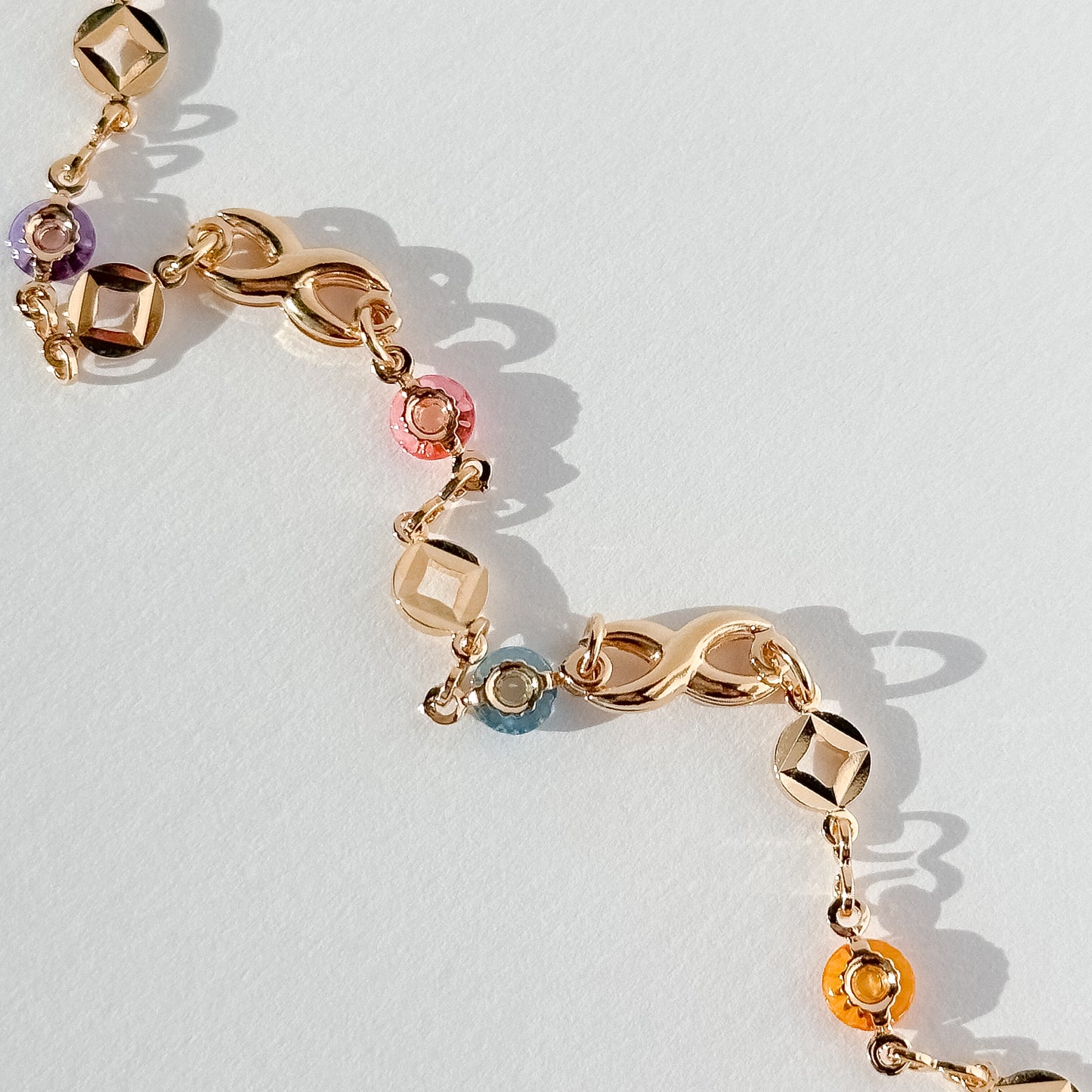 Infinite Signs + Circular Pastel-Toned Gold Filled Glass Bracelet